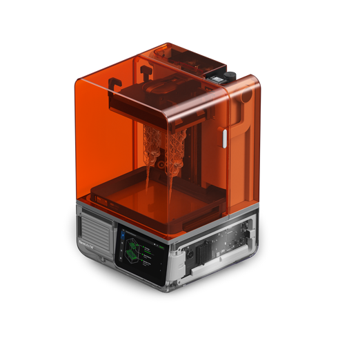 Formlabs Form Studio 1 3D Printer Angle with 3D printed models in build volume
