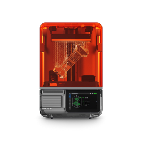 Formlabs Form Studio 1 3D Printer with 3D printed speaker on build platform in printer.