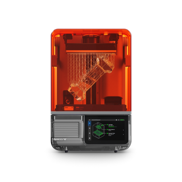 Formlabs Form Studio 1 3D Printer with 3D printed speaker on build platform in printer.