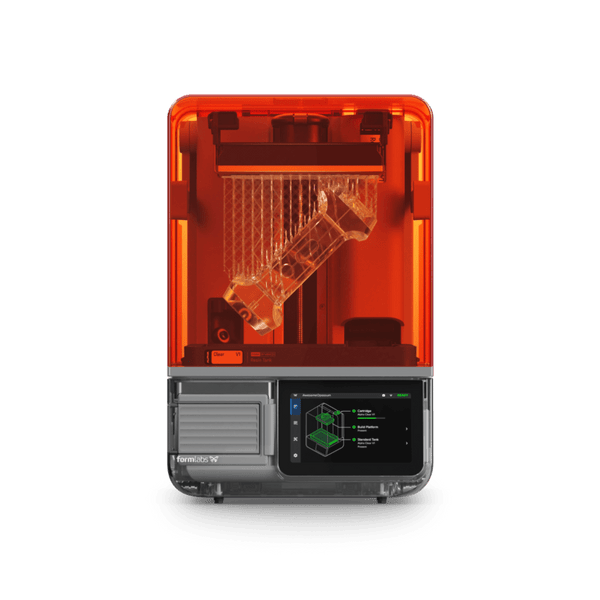 Formlabs Form Studio 1 3D Printer with 3D printed speaker on build platform in printer.