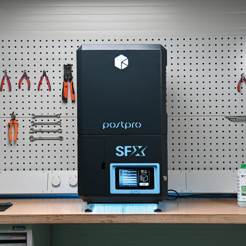 POSTPRO SFX Vapour Smoothing machine on a workbench with tools and supplies in the background